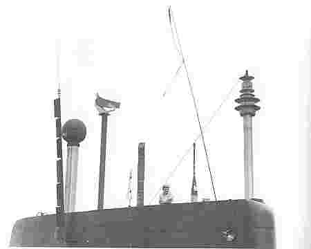 The fin of a streamlined ‘A’ class submarine showing, from right to left, electronic countermeasures mast, attack periscope, search periscope, radar mast, snort induction mast, HF aerial. The snort exhaust mast (just abaft the induction mast) is not visible. The streamlined ‘A’s were fitted with separate and telescopic snort masts, replacing the hinged combined mast.