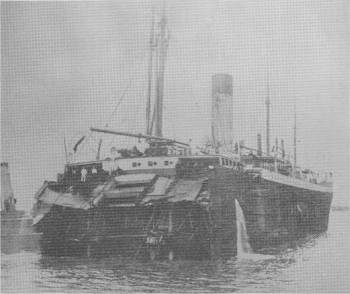 The stern of Suevic being towed into Southampton Docks