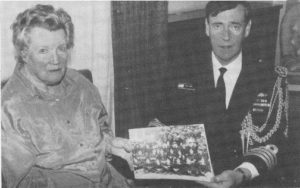 Australian Naval Advisor in the UK, Captain Tim Lewis, accepts awards, decorations, photographs and other memorabilia of Rear Admiral John Dumaresq from Dumaresq's daughter, Mrs Lucia Donaldson-Craig of Maidstone, Kent, at a ceremony at Australia House in London. (Australian High Commission, London)